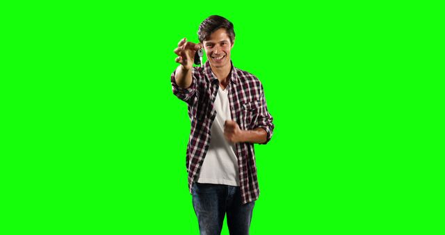 Man Holding Keys Smiling Isolated on Green Screen - Download Free Stock Images Pikwizard.com