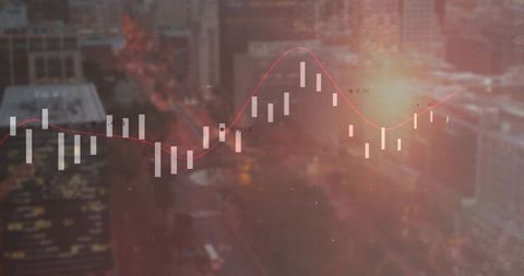 Translucent candlestick chart with red trend line overlaying downtown skyline at dusk