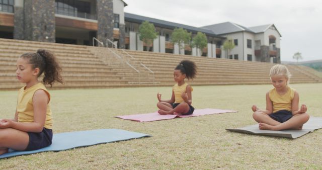 Children Practicing Yoga Outdoors On Mats - Download Free Stock Images Pikwizard.com