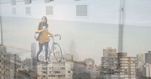 Young Woman in Hijab with Bicycle Overlaid on Urban Landscape