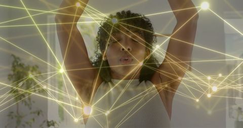 Digital Network Overlay with Teen Practicing Yoga Meditation