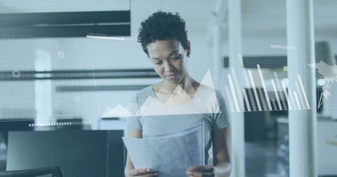 Businesswoman Analyzing Data with Futuristic Holograph