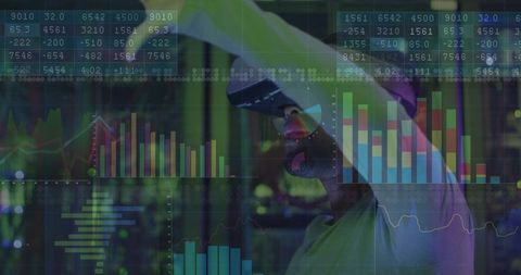 Businessman Using VR for Data Analysis in Futuristic Office