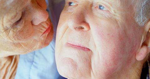 Senior Couple Sharing Intimate Romantic Moment at Home