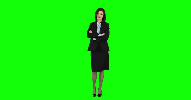 Confident Businesswoman Standing with Arms Crossed on Green Screen Background - Download Free Stock Images Pikwizard.com