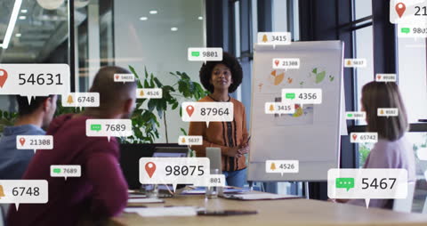 Diverse Team Analyzing Interactive Data in Modern Office