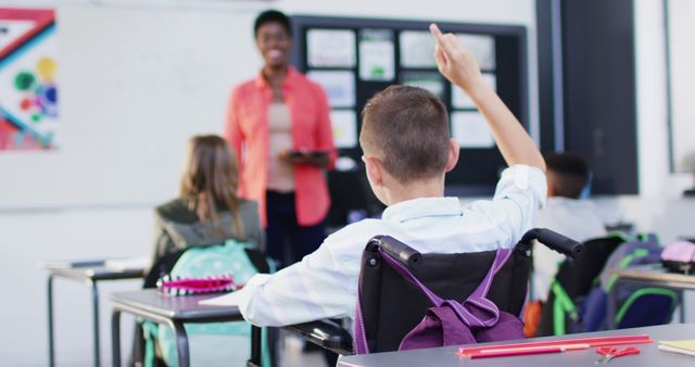 Inclusive Classroom with Male Student in Wheelchair - Download Free Stock Images Pikwizard.com