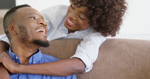 Happy Couple Embracing in Living Room, Enjoying Quality Time - Download Free Stock Images Pikwizard.com