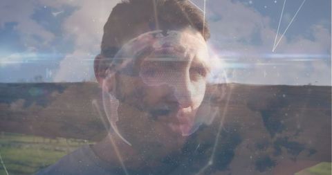 Holographic globe overlaid on rural landscape with pensive man