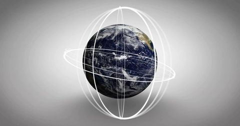 Orbiting earth globe with orbital rings and digital grid for futuristic tech concept