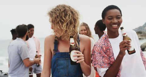 Joyful Friends Celebrating at Sunny Beach Gathering
