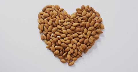 Heart Shape Almond Arrangement on White Background - Download Free Stock Images Pikwizard.com