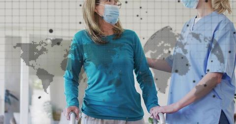 Nurse assisting woman walking with walker while wearing mask with global map overlay