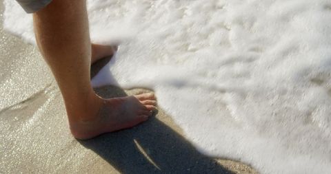Senior Man Enjoying Sea Waves at Sandy Beach Shore - Download Free Stock Images Pikwizard.com