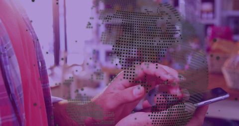 Man Interacting with Smartphone and Digital World Map Interface