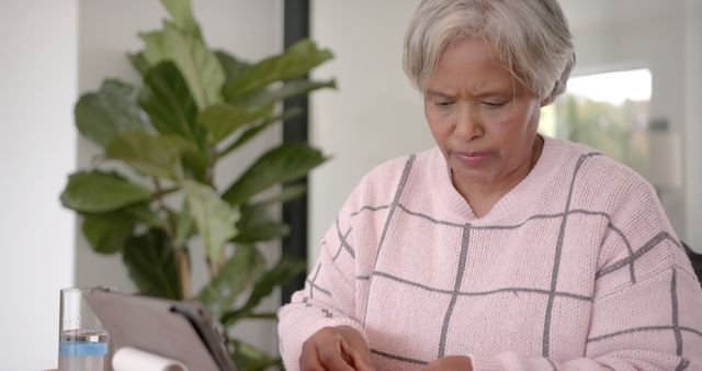 Senior Woman Using Tablet Computer for Online Communication - Download Free Stock Images Pikwizard.com