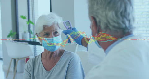 Senior Woman Getting Temperature Checked by Doctor with Data Overlay