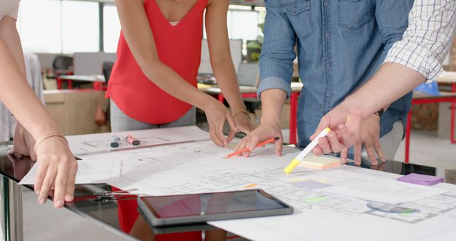 Business Team Collaborating on Blueprint at Office Desk - Download Free Stock Images Pikwizard.com