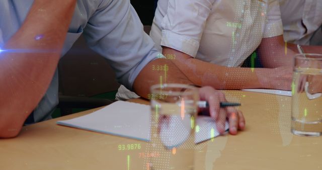 Business Professionals Analyzing Financial Data with Digital Technology Overlay - Download Free Stock Images Pikwizard.com