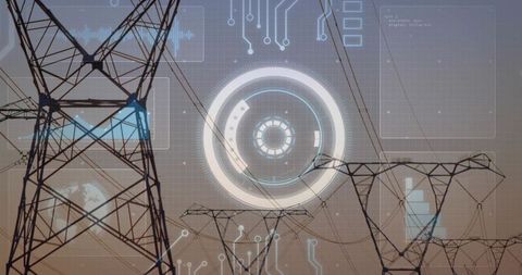 Smart electric grid visualizing digital monitoring over high-voltage transmission towers