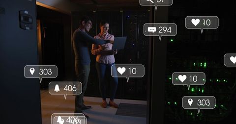 Diverse engineers analyzing data in dimly lit server room with social media interactions