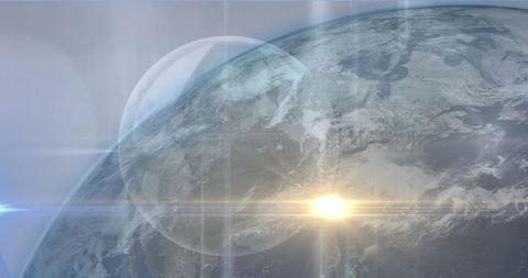 Glowing planet earth with sunrise lens flare