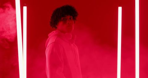 Futuristic Portrait with Red LED Lights in Minimalistic Environment