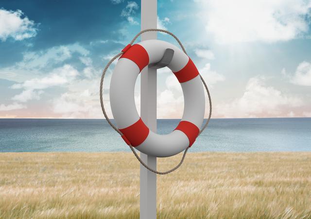 Digital composition of lifebuoy on a pole against field, sea and blue sky in the background