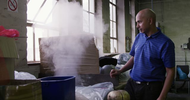 Inspector observing steam rising from a container in an industrial setting. Suitable for use in content related to industrial processes, waste management, ecological efforts, environmental protection, sustainability practices, industrial inspections, and workplace safety.