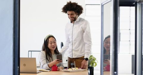 Celebration Moment in Modern Office with Colleagues