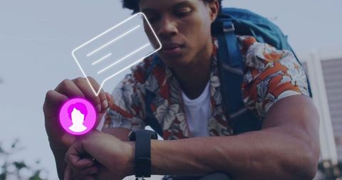 Man using smartwatch hologram in urban setting