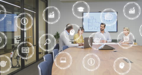 Diverse Team Collaborates with Overlaid Technology Icons in Modern Office