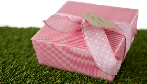 transparent pink gift box with ribbon on grass and mother's day tag - Download Free Stock Videos Pikwizard.com