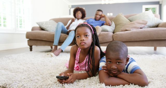 Family Bonding Time Watching Television in Living Room - Download Free Stock Images Pikwizard.com