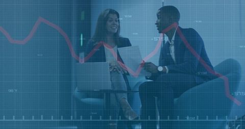 Financial Advisors Analyzing Stock Market Trends on Laptop