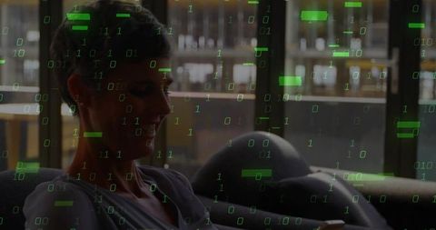 Woman Relaxing on Sofa Scrolling Smartphone with Digital Binary Overlay for Tech Concept