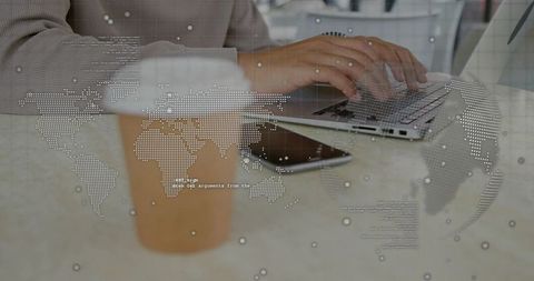 Man typing on laptop at cafe with world map and data overlay for remote work concept