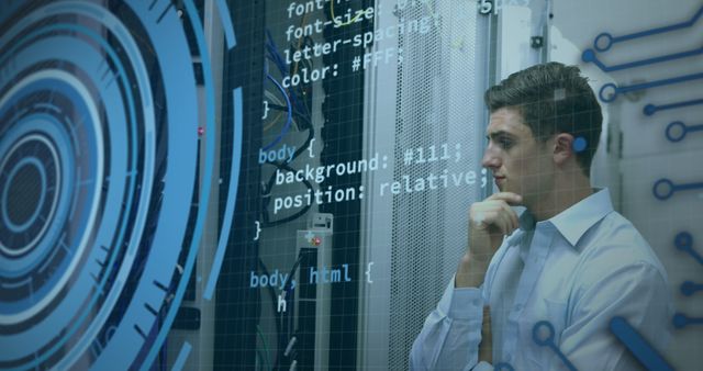 Thoughtful Software Engineer Overlooking Data in Futuristic Server Room - Download Free Stock Photos Pikwizard.com