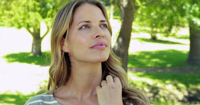 Woman Reflecting Deep in Thought in Sunny Park - Download Free Stock Images Pikwizard.com