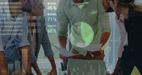 Diverse Business Team Analyzing Digital Data Graphs