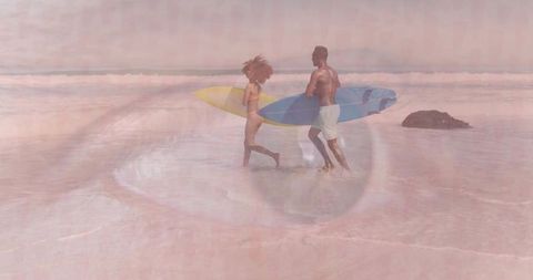 Walking couple carrying surfboards with dreamy eye double-exposure on pastel beach