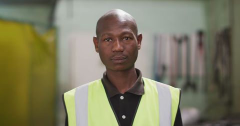 Industrial factory worker in high visibility vest portrait