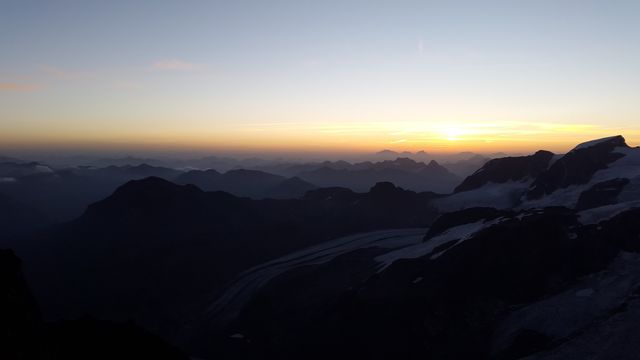 Stunning Mountain View at Sunrise with Silhouetted Peaks - Download Free Stock Images Pikwizard.com