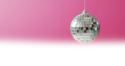 Disco Ball Reflecting on Vibrant Pink Gradient Background - Download Free Stock Images Pikwizard.com