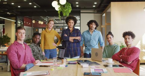 Diverse Creative Team Together in Modern Office Space