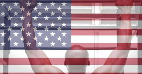 Muscular Man Working Out Against American Flag Overlay