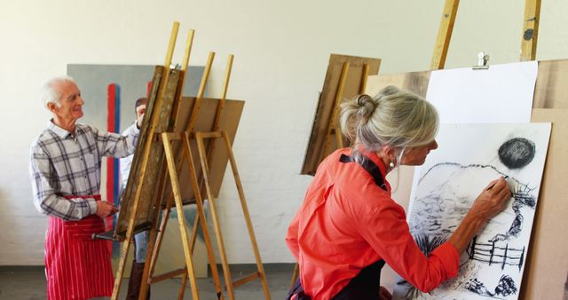 Senior Artists Painting in Classroom Studio - Download Free Stock Images Pikwizard.com