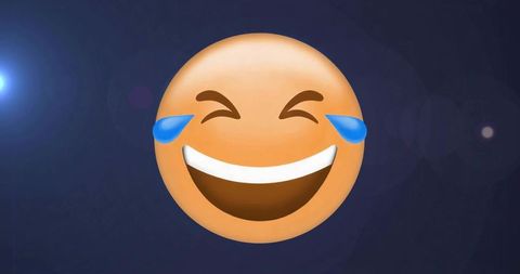 Laughing-crying emoji on gradient background with lens flare