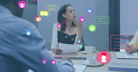 Diverse Team Discussing Ideas with Digital Communication Overlay