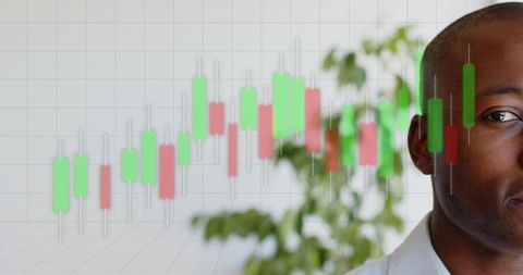 Businessman analyzing candlestick chart overlay for financial market analysis and trading